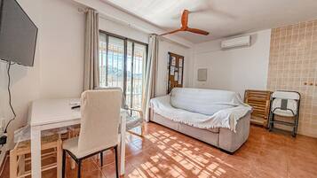 Apartamento, 1 habitación, fumadores, terraza | Zona de estar