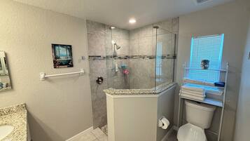Shower, hair dryer, towels, soap