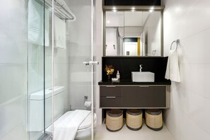 Shower, hair dryer, towels, soap