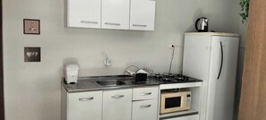 Apartment | Private kitchen - Studio Centro - Estadia Longa (Foz do Iguaçu)
