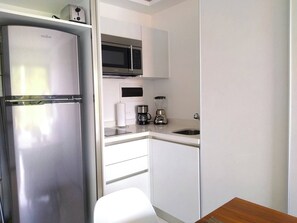 Fridge, microwave, coffee/tea maker, toaster
