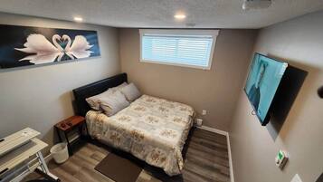 2 habitaciones, tabla de planchar con plancha, wifi y ropa de cama