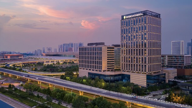A modern building with a prominent sign reading "INTERCONTINENTAL." - InterContinental Zhengzhou Zhengdong by IHG (Zhengzhou)
