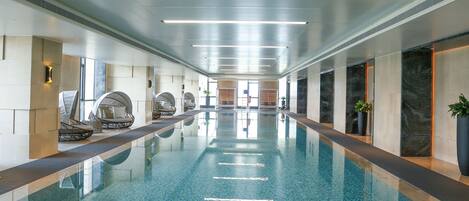 Indoor pool, open 6:00 AM to 11:00 PM, pool umbrellas, sun loungers