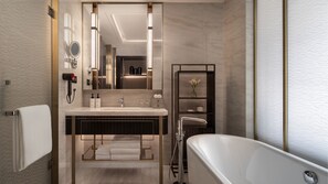Separate bathtub and shower, rainfall showerhead, hair dryer, bathrobes
