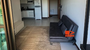 Basic Apartment | Living area | Flat-screen TV