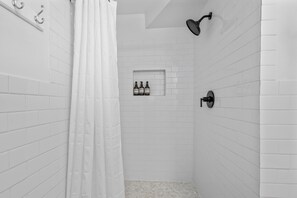 Shower, hair dryer, towels, soap