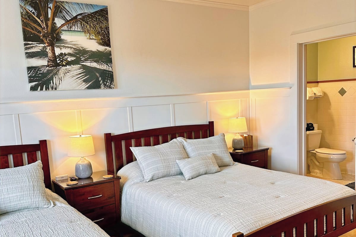 Classic Quadruple Room, 2 Queen Beds, Park View | Individually decorated, individually furnished, laptop workspace