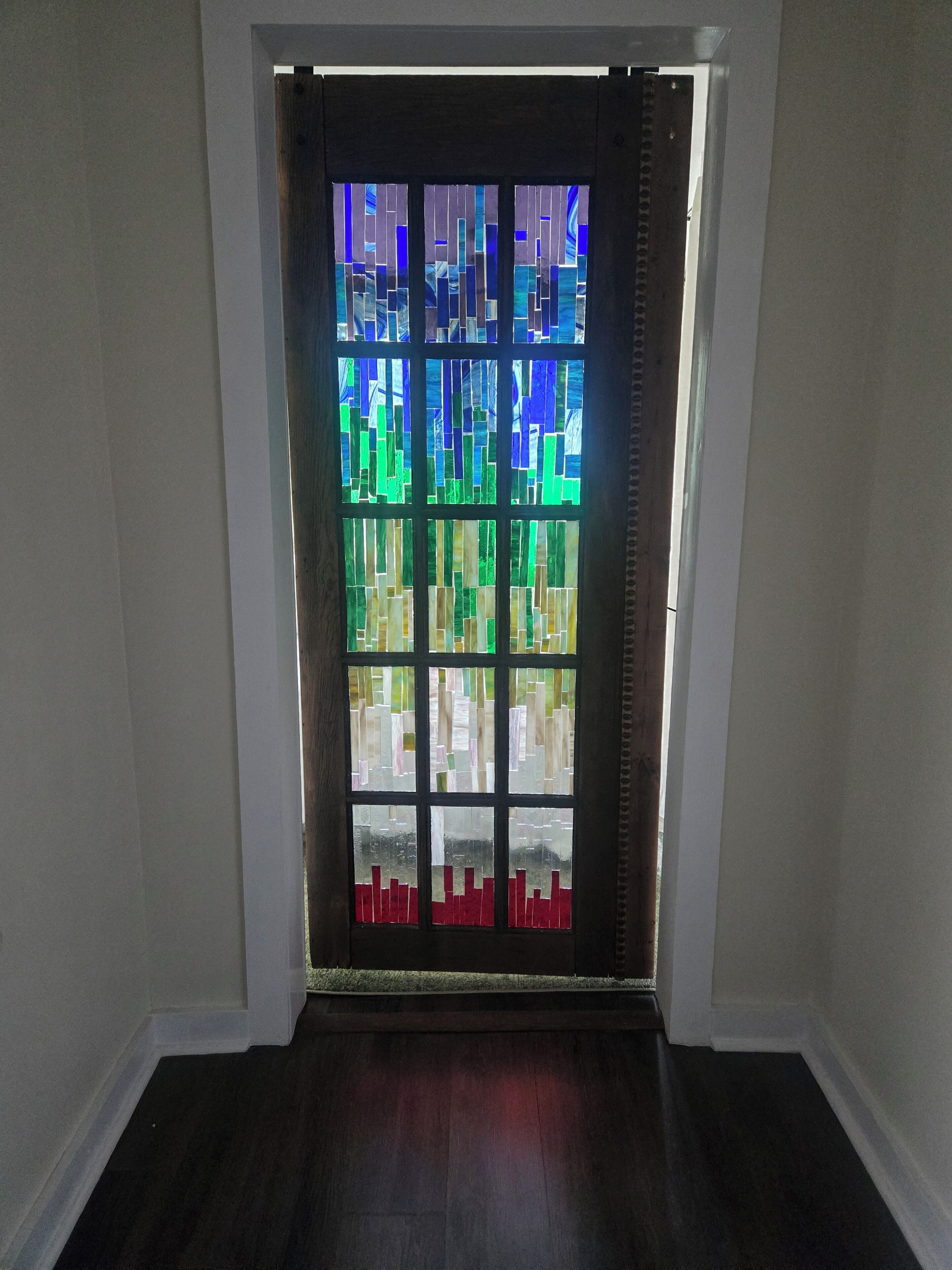A door with a stained glass design.
