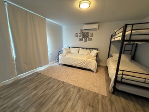 4 bedrooms, desk, iron/ironing board, travel cot
