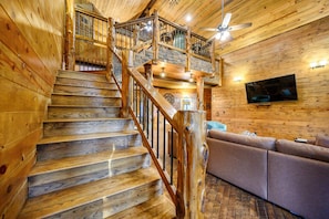 Smart TV, fireplace - Excalibur Cabin – Sleeps 24 | 2 Hot Tubs, Game Loft, Outdoor Oasis, Handicap Accessible (Broken Bow)