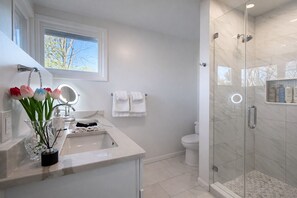 Shower, eco-friendly toiletries, hair dryer, towels