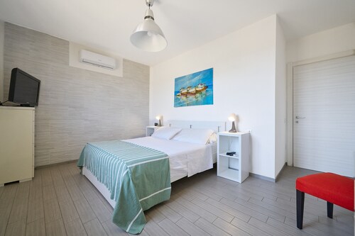 Ferienwohnung 'La Casa Rossa' mit gemeinsamer Terrasse, Wi-Fi und Klimaanlage