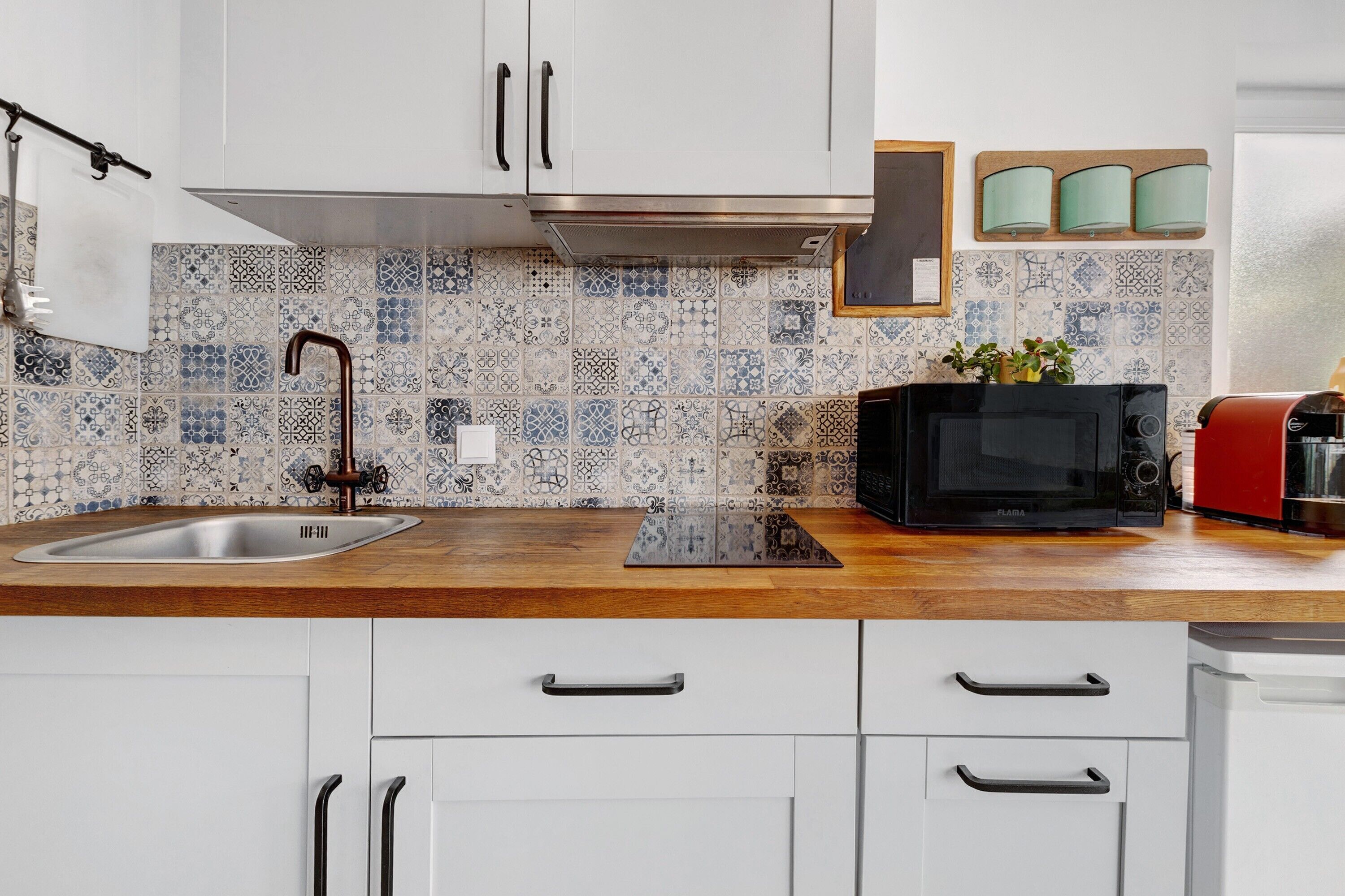 Fridge, microwave, stovetop, coffee/tea maker