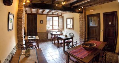 Rural House 'El Encuentro' with Traditional Adobe and Wood Architecture