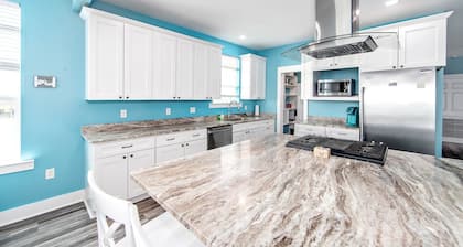 Coastal View: A charming 3-bedroom camp in Grand Isle, LA, across from the beach.