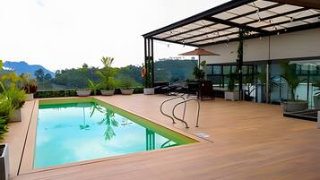 Basic Apartment | Pool | 13 outdoor pools, open 8:00 AM to 8:00 PM, pool umbrellas