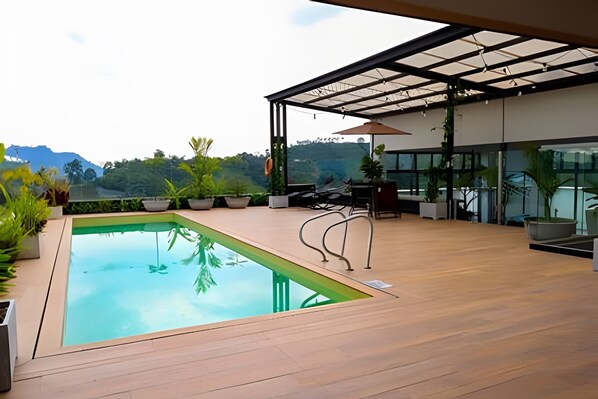 Basic Apartment | Pool | 13 outdoor pools, open 8:00 AM to 8:00 PM, pool umbrellas - Naturaleza y Confort - Sta Rosa de cabal (Santa Rosa de Cabal)