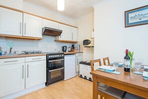 Microwave, toaster, cookware/dishes/utensils