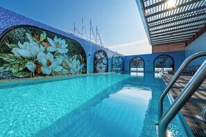 Indoor pool, open 6:00 AM to 10:00 PM, pool umbrellas, pool loungers - Grand Luxury Hotel Ninh Chu (Phan Rang - Thap Cham)