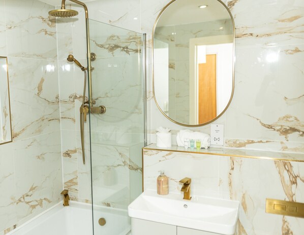 Shower, hair dryer, towels