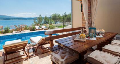Beachfront villa Noa with heated pool