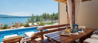Beachfront villa Noa with heated pool