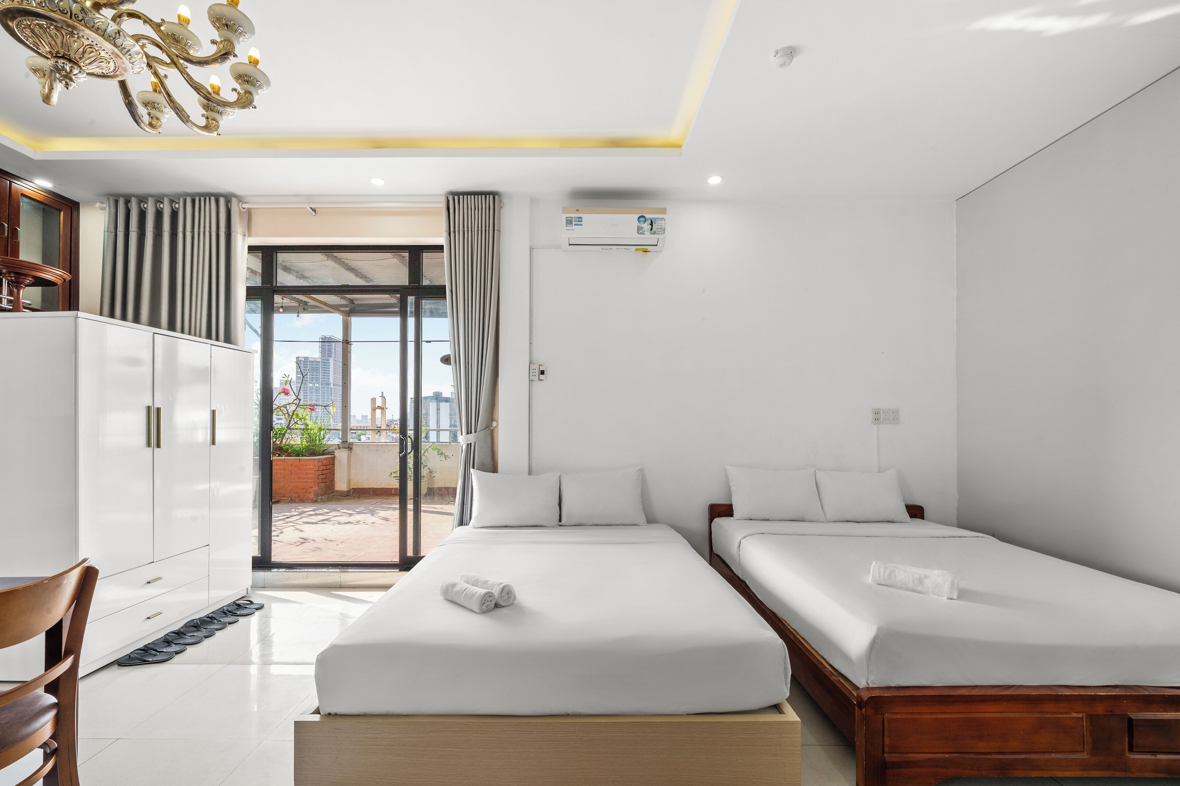 Family Room, City View | Minibar, desk, free WiFi, bed sheets