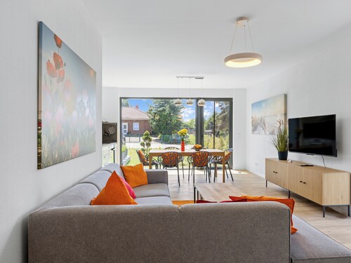 Modern holiday home with a terrace and a garden