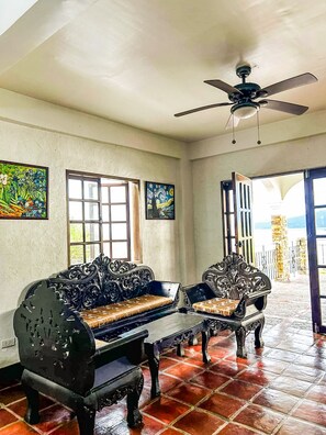 Family Suite, Multiple Beds, Patio, Sea View | Living area | Flat-screen TV - Casa Del Faro (Puerto Galera)
