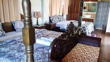 Suite Keluarga, Beberapa Tempat Tidur, patio, pemandangan laut | Brankas dan Wi-Fi gratis