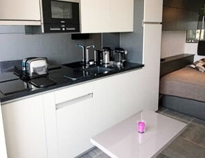 Fridge, microwave, dishwasher, coffee/tea maker