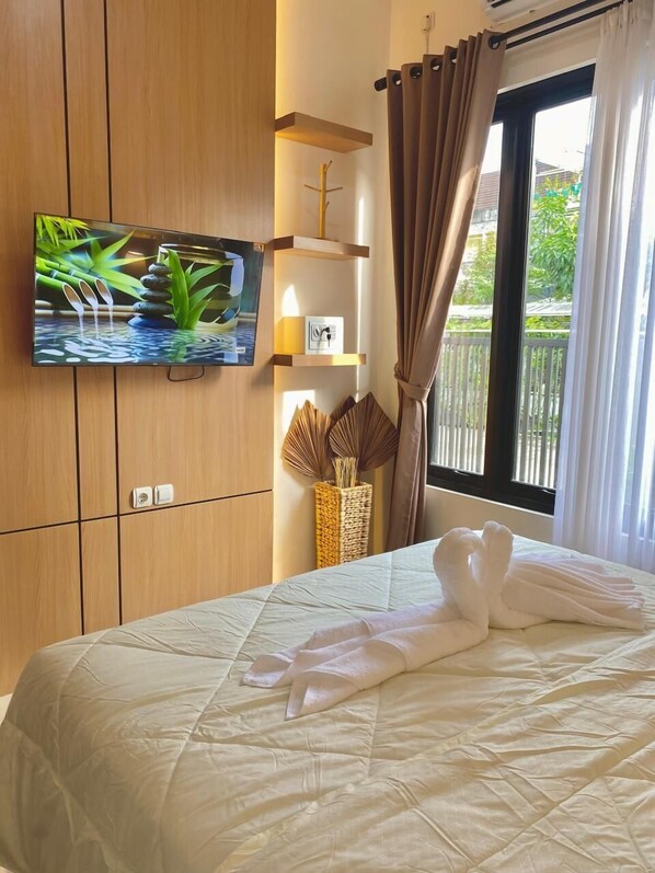 Habitación doble Deluxe, balcón, vista a la montaña | Cortinas blackout, insonorización y wifi gratis 