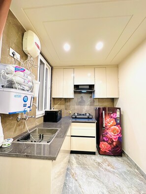 Deluxe appartement, uitzicht op stad | Magnetron