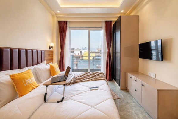 Appartement Deluxe, vue sur la ville | 1 chambre, bureau, espace de travail pour ordinateurs portables