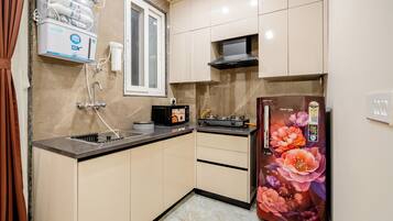 Microwave, stovetop, coffee/tea maker, electric kettle