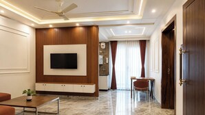 Appartement Deluxe, vue sur la ville | Aire de séjour