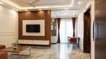 Deluxe Apartment, City View | Living area | 43-inch LED TV with satellite channels, Netflix, streaming services