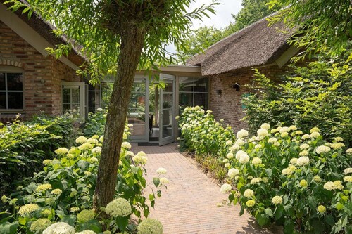 Loft romántico con terraza en el jardín