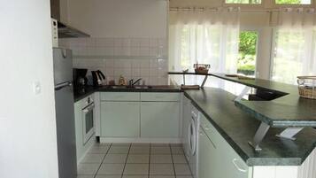 Fridge, microwave, oven, cookware/dishes/utensils