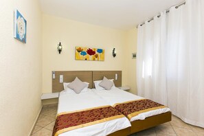 2 quartos, ferros/tábuas de passar roupa, Wi-Fi de cortesia