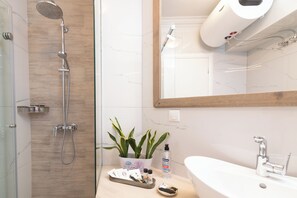 Hair dryer, towels, soap, shampoo