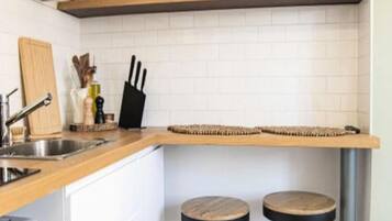 Fridge, coffee/tea maker, cookware/dishes/utensils