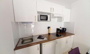 Fridge, microwave, electric kettle, toaster