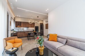 Comfort Apartment | Living area | 55-inch Smart TV with cable channels - Margiani apartment (Chania)