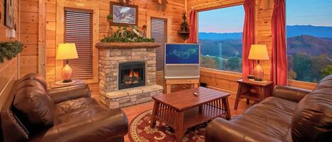 Een televisie, een open haard, een dvd-speler en een kantoor