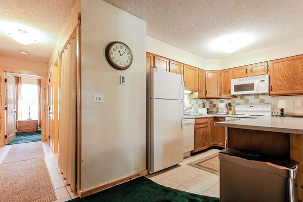 Condo, Multiple Beds, Fireplace (Family Fun Condo) | Private kitchen | Fridge, microwave, stovetop, dishwasher
