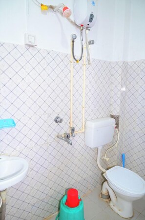 Shower, rainfall showerhead, towels, soap