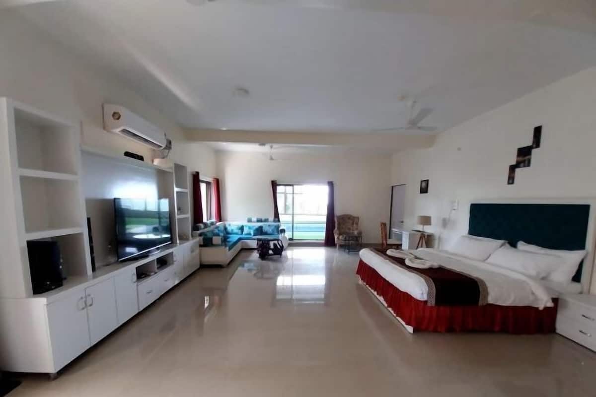 Desk, laptop workspace, bed sheets