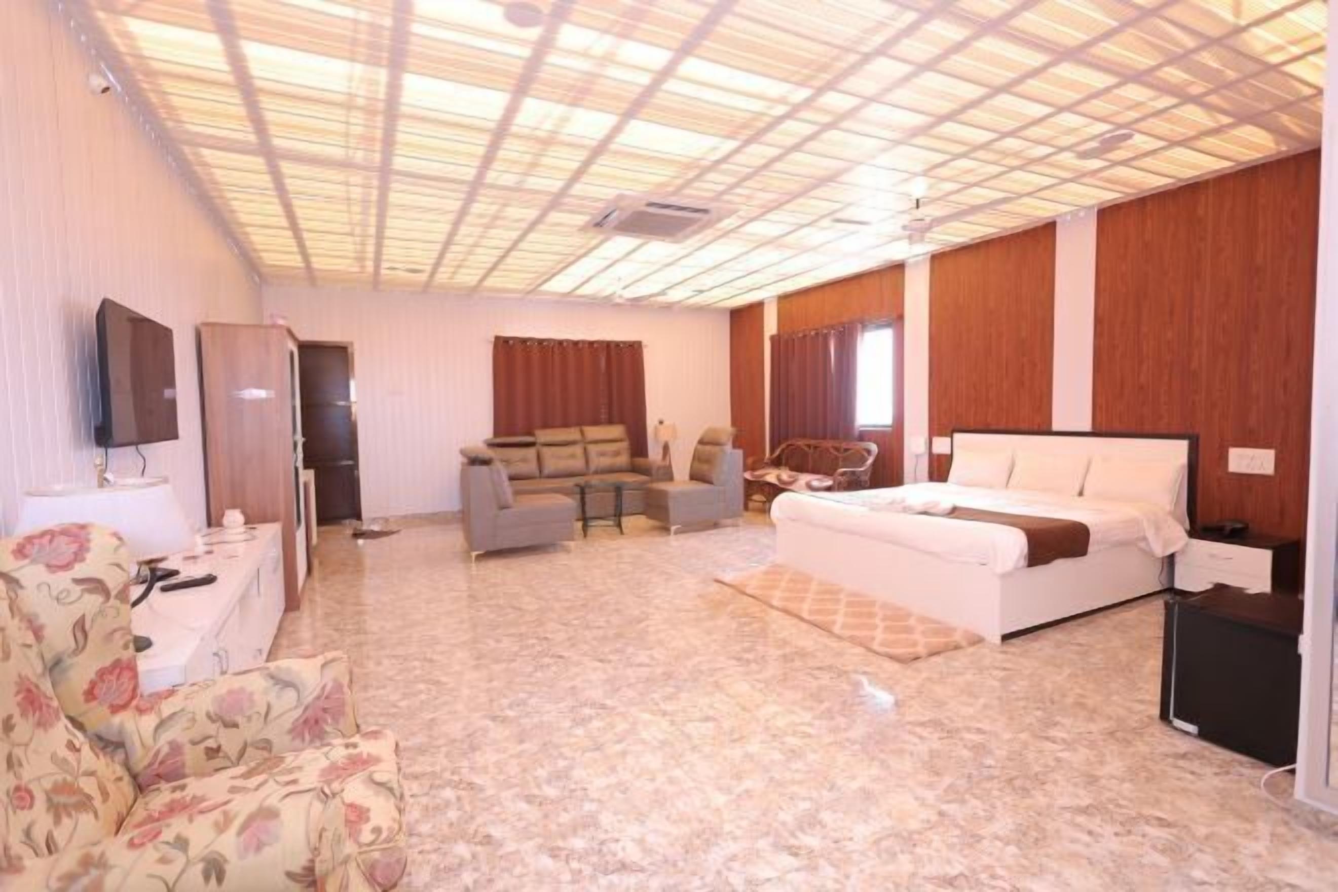 Desk, laptop workspace, bed sheets